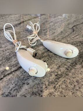 Lot Of 2 OEM Nintendo Wii White Nunchucks - Cosmetic Damage & Sticky Button